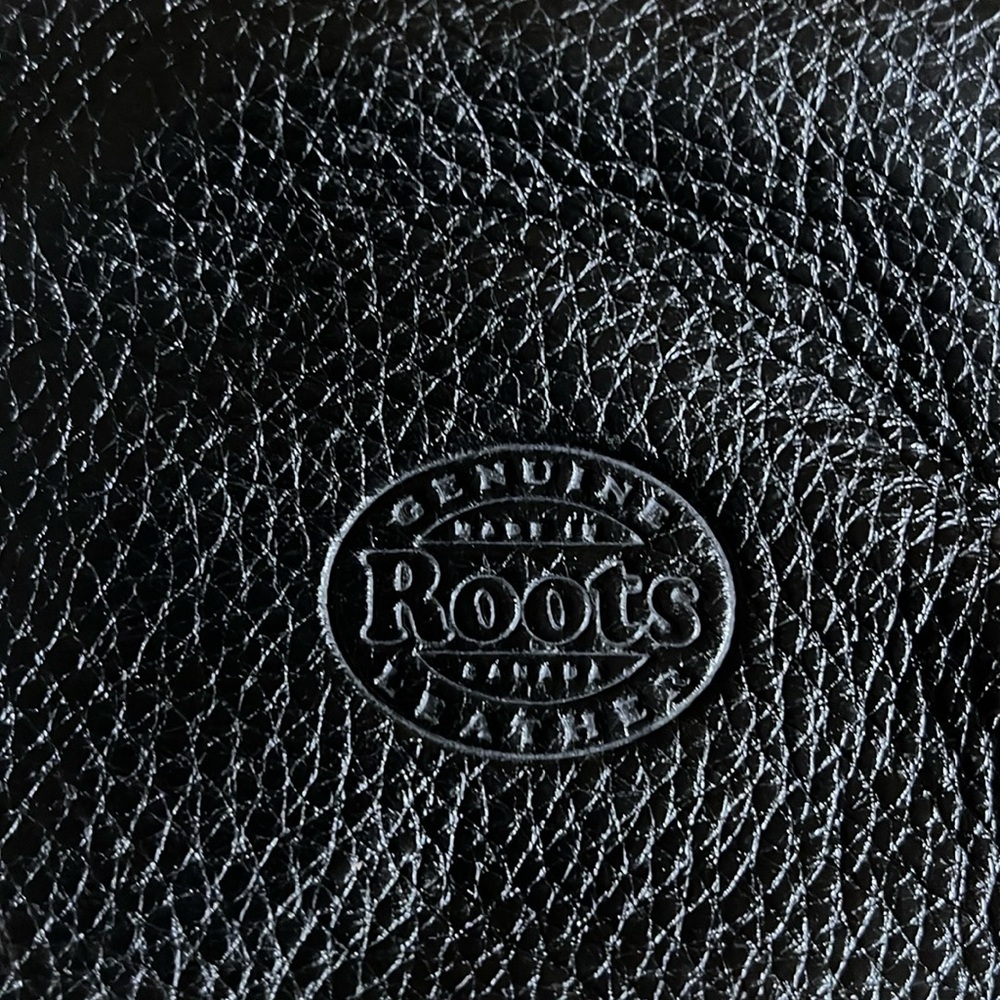 Roots leather pouch.